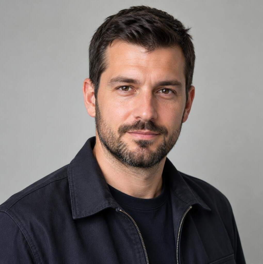 Portrait of a bearded man looking at the camera